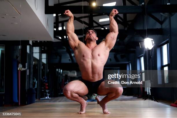 Chris Kavvalos practices posing manoeuvres during a workout at City Gym on May 24, 2020 in Sydney, Australia. IFBB body builder Chris Kavvalos has...