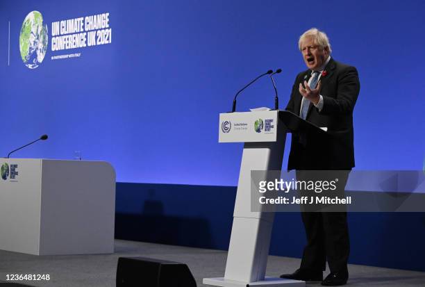 British Prime Minister Boris Johnson speaks during a press conference on day eleven of the COP26 climate change conference at the SEC on November 10,...