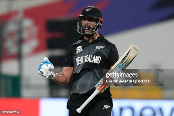 New Zealand's Daryl Mitchell celebrates after playing the winning shot at the end of the ICC mens Twenty20 World Cup semi-final match between England...