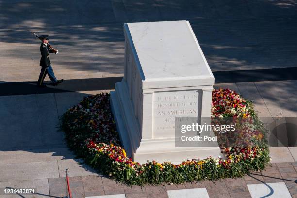 The Tomb of the Unknown Soldier is surrounded by flowers during a centennial commemoration event at the Tomb of the Unknown Soldier in Arlington...