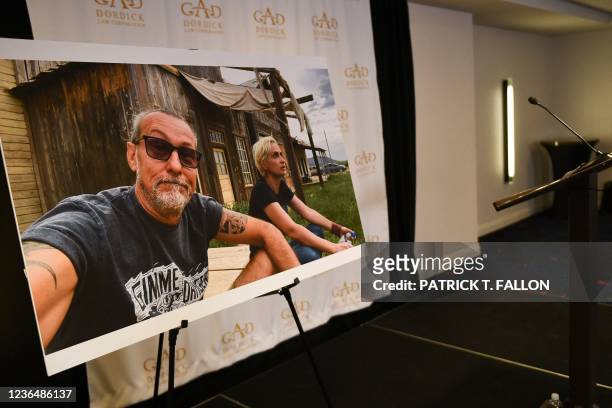 Photo of Serge Svetnoy and Halyna Hutchins is displayed after a press conference with attorney Gary Dordick and Serge Svetnoy, chief lighting...