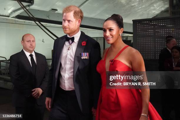 Britain's Prince Harry, Duke of Sussex and Meghan, Duchess of Sussex, arrive to the Intrepid, Sea Air & Space Museum's inaugural Intrepid Valor...