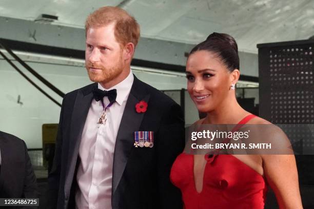 Britain's Prince Harry, Duke of Sussex and Meghan, Duchess of Sussex, arrive to the Intrepid, Sea Air & Space Museum's inaugural Intrepid Valor...