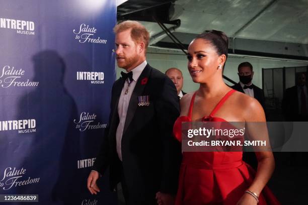 Britain's Prince Harry, Duke of Sussex and Meghan, Duchess of Sussex, arrive to the Intrepid, Sea Air & Space Museum's inaugural Intrepid Valor...