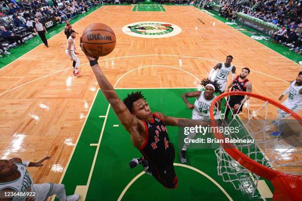 Scottie Barnes of the Toronto Raptors grabs a rebound against the Boston Celtics on November 10, 2021 at the TD Garden in Boston, Massachusetts. NOTE...