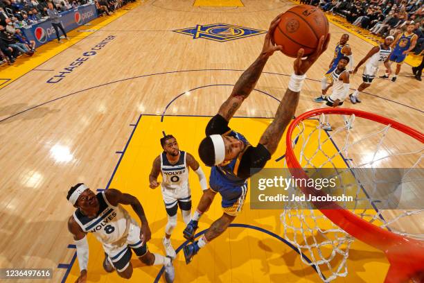 Gary Payton II of the Golden State Warriors dunks the ball against the Minnesota Timberwolves on November 10, 2021 at Chase Center in San Francisco,...