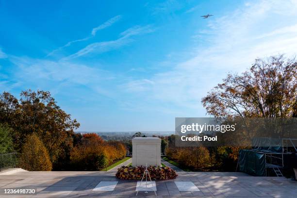 Coast Guard C-130 Hercules flies over during a centennial ceremonyat the Tomb of the Unknown Soldier in Arlington National Cemetery on November 11 in...