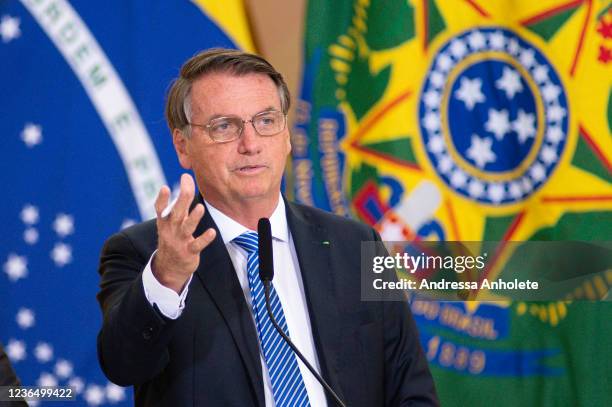 Brazilian President Jair Bolsonaro speaks during the Presentation of Food Donation Program at Planalto Palace on November 11, 2021 in Brasilia,...