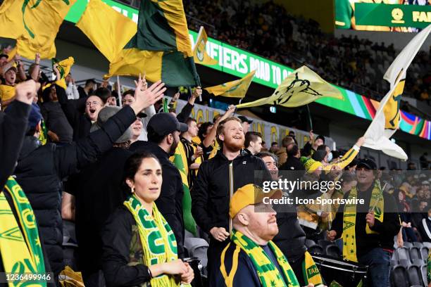 Australian fans sing the national anthem during the World Cup Qualifier football match between Australia Socceroos and Saudi Arabia on November 11,...