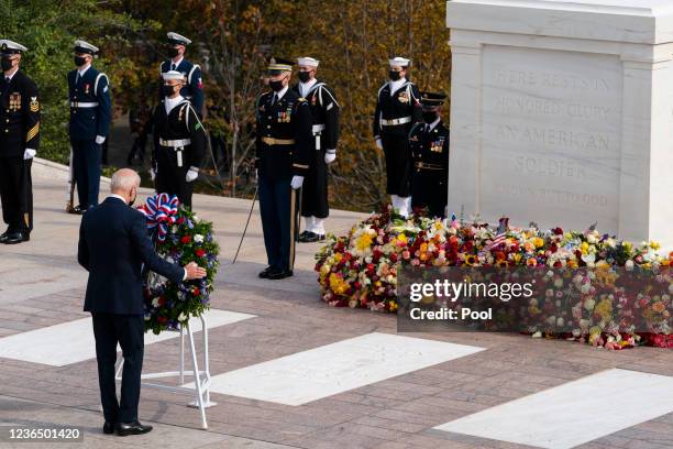 President Joe Biden places a wreath during a centennial ceremony at the Tomb of the Unknown Soldier in Arlington National Cemetery on November 11 in...