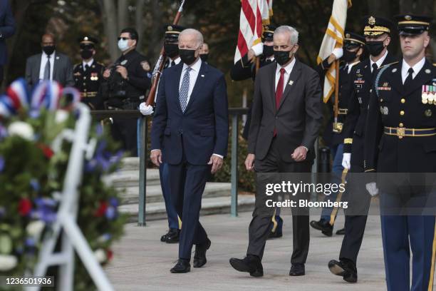 President Joe Biden, left, and Denis McDonough, secretary of Veterans Affairs, center, participate in a Presidential Armed Forces Full Honor...