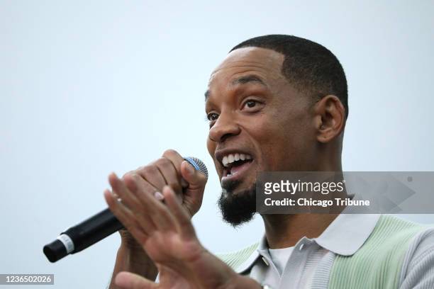 Actor Will Smith speaks during a tour of the XS Tennis and Education Foundation, 5336 S. State St., Wednesday, Nov. 10 in Chicago. Smith, with fellow...