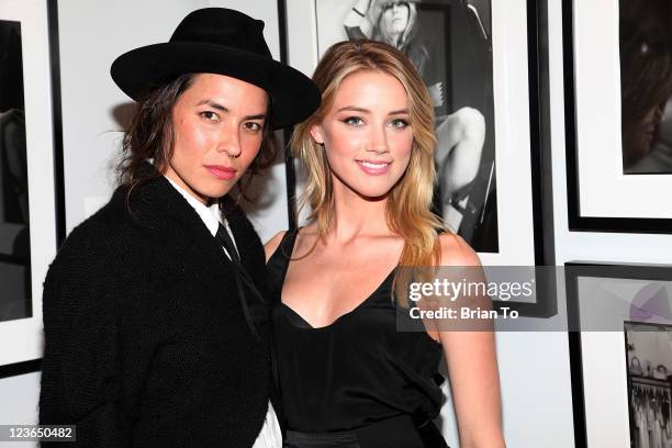 Artist Tasya van Ree and Amber Heard attend 2011 Los Angeles Comikaze Expo kick-off party at the Celebrity Vault on December 15, 2010 in Beverly...