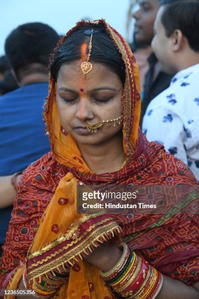 Chhath devotee perform rituals in Ganga river at Danapur ghat in Patna on the occasion of Chhath Puja festival on November 11, 2021 in Patna, India....