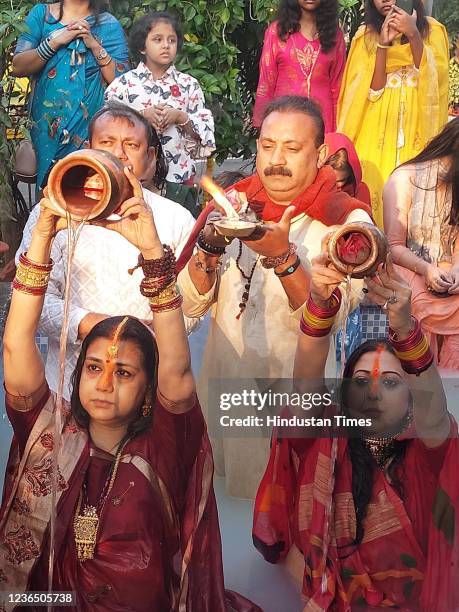 Bihar Minister Ashok Choudhary with his wife Neeta Choudhary offer prayers on the occasion of Chhath Puja on November 11, 2021 in Patna, India....