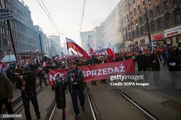 Participants of the march hold a banner saying "Independence is Not for Sale" during the Independence March. Poland's National Independence Day marks...