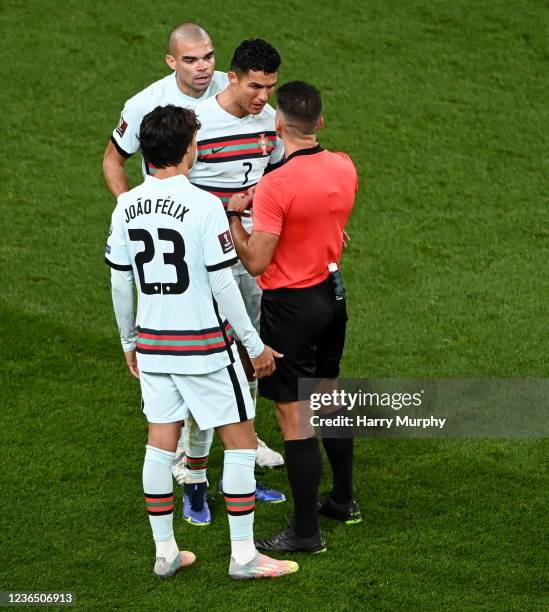 Dublin , Ireland - 11 November 2021; Cristiano Ronaldo of Portugal appeals to Referee Jesús Gil Manzano after Pepe of Portugal was shown a red card...