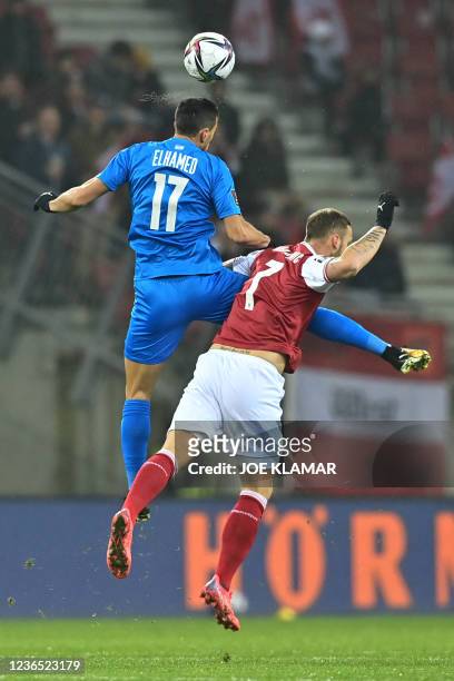 Israel's defender Hatem Abd Elhamed and Austria's forward Marko Arnautovic vie for the ball during the FIFA World Cup Qatar 2022 qualification Group...
