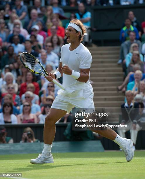 Rafael Nadal of Spain celebrates after winning a point against Nick Kyrgios of Australia in the men's singles fourth round during day eight of the...