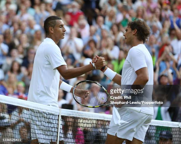 Nick Kyrgios of Australia is congratulated by Rafael Nadal of Spain after the men's singles fourth round during day eight of the 2014 Wimbledon...