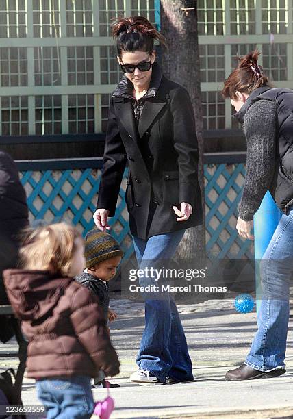 Actress Sandra Bullock and son Louis Bullock are seen on the streets of Manhattan on March 20, 2011 in New York City.