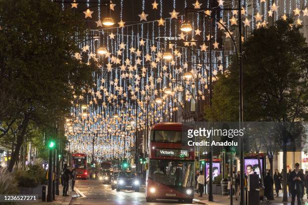 The Christmas lights on Oxford Street are seen as part of the world's largest Christmas lights collection switch on in London, United Kingdom on...