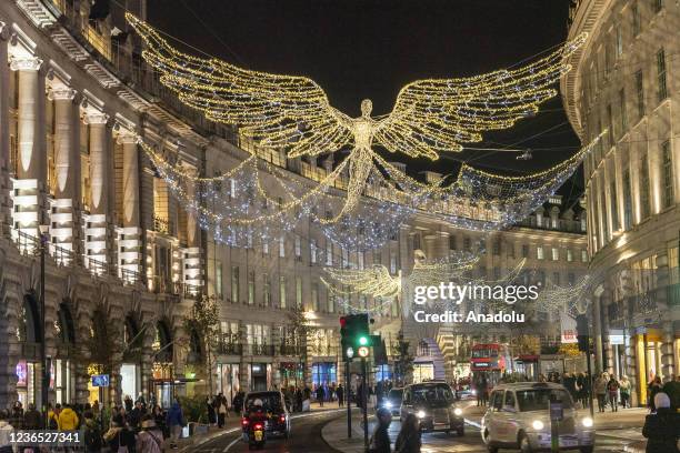 The Christmas lights on Regent Street are seen as part of the world's largest Christmas lights collection switch on in London, United Kingdom on...