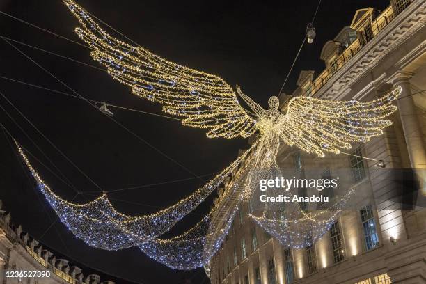 The Christmas lights on Regent Street are seen as part of the world's largest Christmas lights collection switch on in London, United Kingdom on...