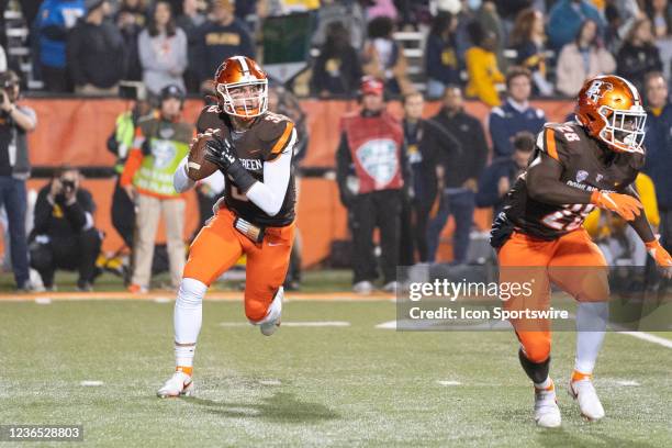 Bowling Green Falcons Quarterback Matt McDonald rolls out looking to throw the ball during the first half of the College Football game between the...