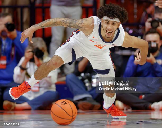 Andre Curbelo of the Illinois Fighting Illini eyes the loose ball during the second half against the Arkansas State Red Wolves at State Farm Center...
