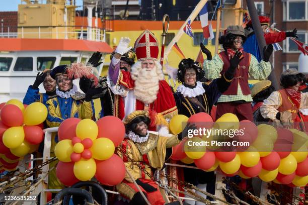 Sinterklaas arrives by boat as thousands of local residents attend the traditional arrival of Sinterklaas and his black Petes in the port of The...