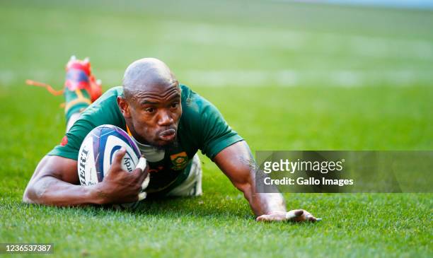 Makazole Mapimpi of South Africa going over for a try during the 2021 Castle Lager Outgoing Tour match between South Africa and Scotland at...