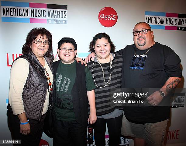 Diane Rodriguez, Rico Rodriguez, Raini Rodriguez, and Roy Rodriguez attend 2010 American Music Awards pre-party charity bowl tournament at Lucky...