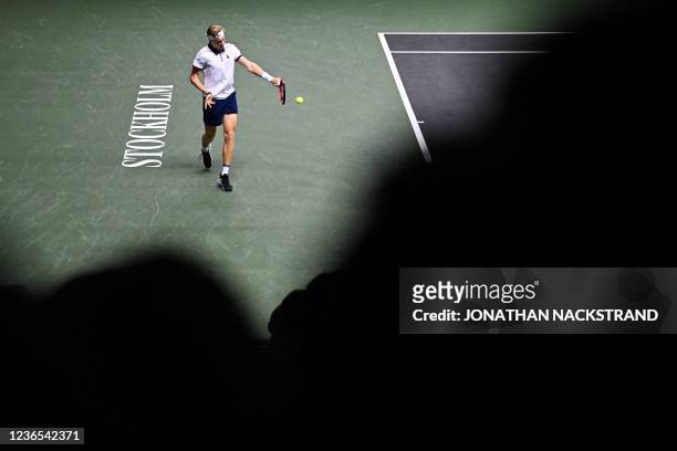 Canada's Denis Shapovalov returns the ball to USA's Tommy Paul during the singles final match of the ATP Stockholm Open tennis tournament in...