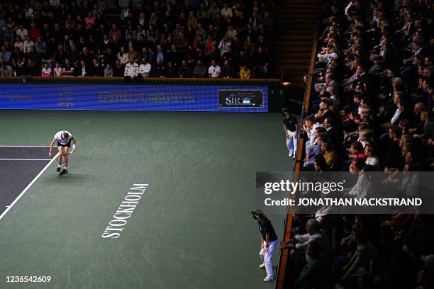 Canada's Denis Shapovalov reacts as he playes against USA's Tommy Paul during the singles final match of the ATP Stockholm Open tennis tournament in...