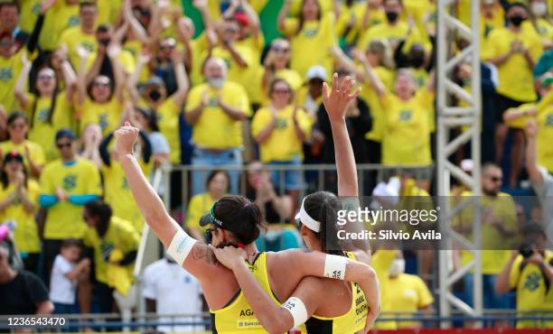 Agatha Bednarczuk and Eduarda Lisboa of Brazil celebrates after the Women's Semifinals match against Terese Cannon and Sara Hughes of team USA on day...