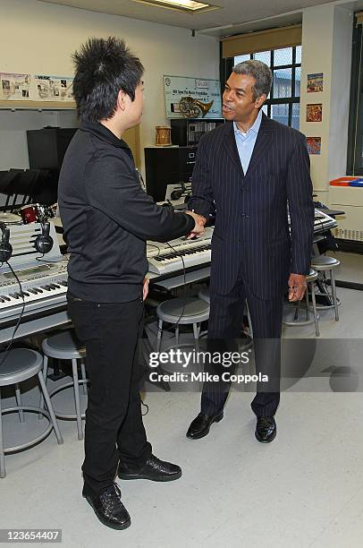 Pianist Lang Lang, and executive director, VH1 Save The Music Foundation Paul Cothran visit PS 334 - The Anderson School on January 3, 2011 in New...