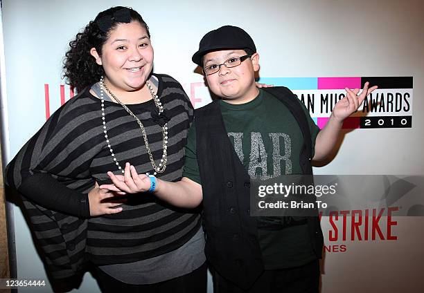 Raini Rodriguez and Rico Rodriguez attend 2010 American Music Awards pre-party charity bowl tournament at Lucky Strike Lanes at L.A. Live on November...