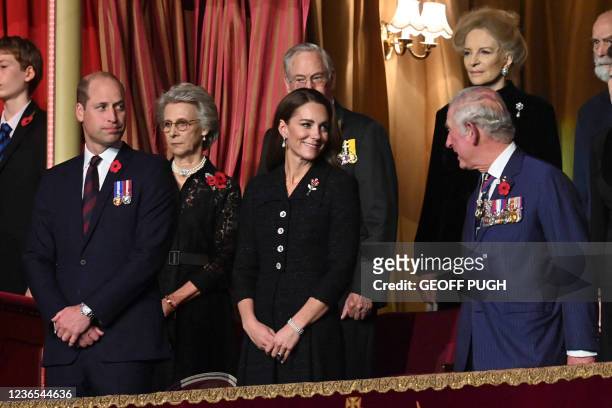 Britain's Prince William, Duke of Cambridge , Britain's Catherine, Duchess of Cambridge, and Britain's Prince Charles, Prince of Wales attend the...