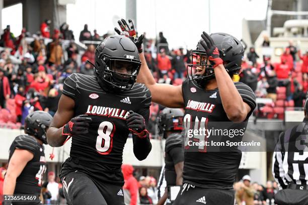 Louisville Cardinals wide receiver Tyler Harrell and Louisville Cardinals tight end Dez Melton celebrate after a touchdown during the college...