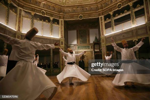 Devotees performing during the ceremony. Whirling dervishes perform the ritual of the Mevlevi, known as "Sema" ceremony which was confirmed by UNESCO...