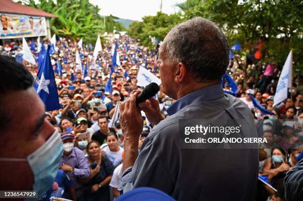 Honduran presidential candidate for the ruling National party Nasry Asfura delivers a speech during a rally in Macuelizo, Santa Barbara department,...