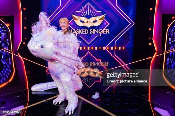 November 2021, North Rhine-Westphalia, Cologne: Andrea Sawatzki, actress, is on stage as the unmasked character "The Axolotl" in the Prosieben show...