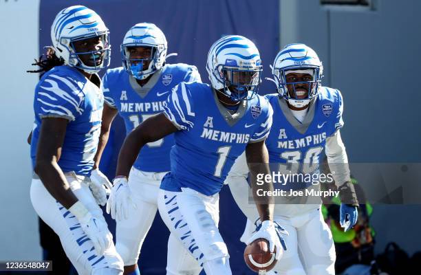 Tyrez Lindsey, Quindell Johnson, Jacobi Francis and Rodney Owens of the Memphis Tigers celebrate an interception against the East Carolina Pirates on...