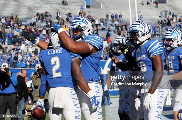 Rodrigues Clark and Dylan Parham of the Memphis Tigers celebrate a touchdown against the East Carolina Pirates on November 13, 2021 at Liberty Bowl...
