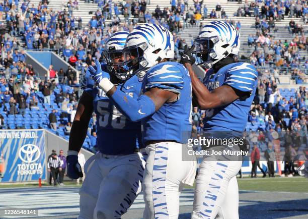 Rodrigues Clark of the Memphis Tigers celebrates a touchdown with teammates against the East Carolina Pirates on November 13, 2021 at Liberty Bowl...