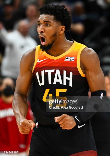 Donovan Mitchell of the Utah Jazz reacts to a play in the second half during a game against the Miami Heat at Vivint Smart Home Arena on November 13,...