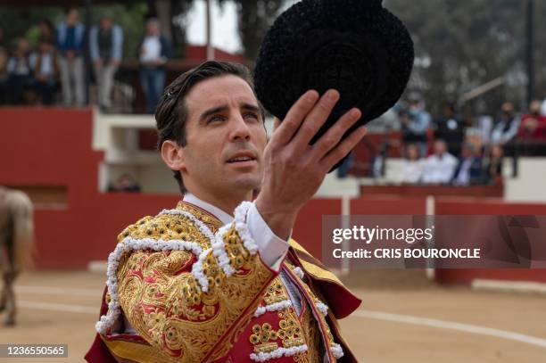 Spanish bullfighter Juan Ortega performs at the Esperanza bullring in Pachacamac, Peru, on November 13, 2021. - Peru's bullfighting, about as popular...