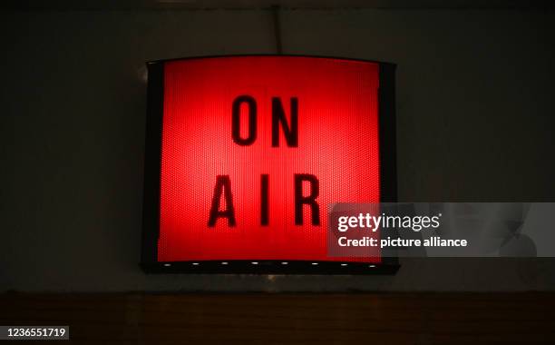 November 2021, Thuringia, Ilmenau: "On Air" is written on a red light during the weekly morning show at Germany's oldest student radio station. More...