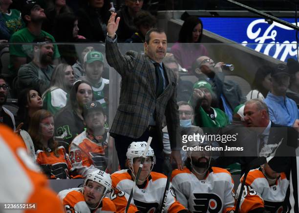 Alain Vigneault of the Philadelphia Flyers calls from the bench against the Dallas Stars at the American Airlines Center on November 13, 2021 in...